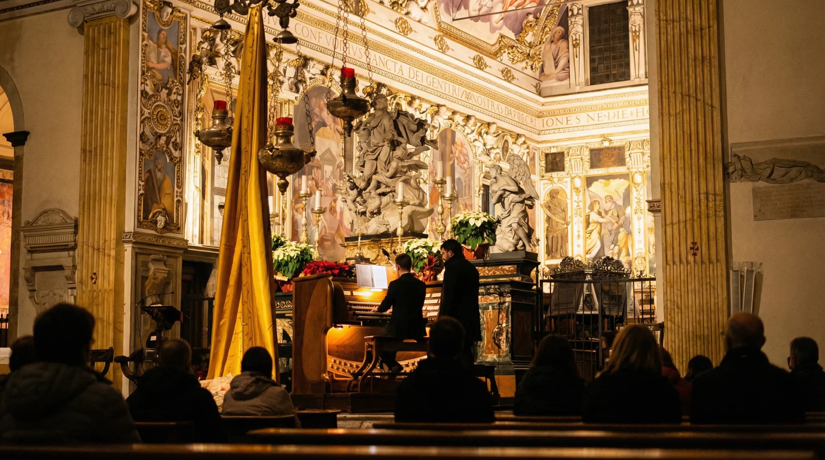 Two musicians at the organ